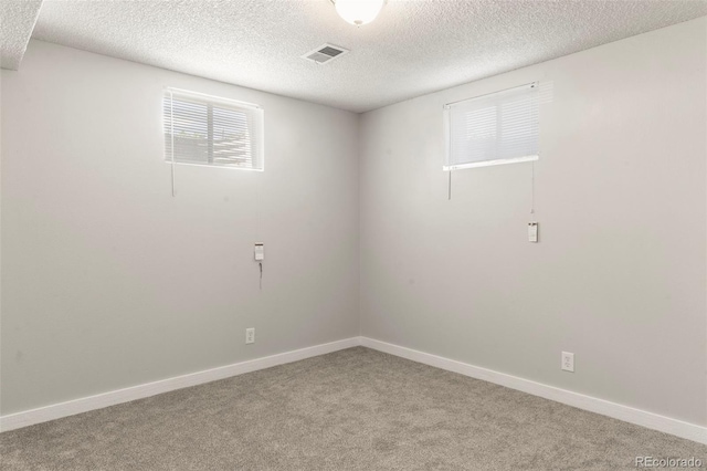 11917 Lavinia Way, Northglenn, CO 80233 - carpeted spare room featuring a textured ceiling