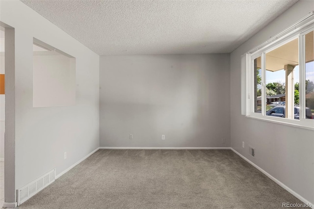 11917 Lavinia Way, Northglenn, CO 80233 - carpeted spare room with a textured ceiling and baseboards