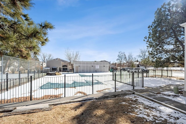 pool featuring a patio area and fence