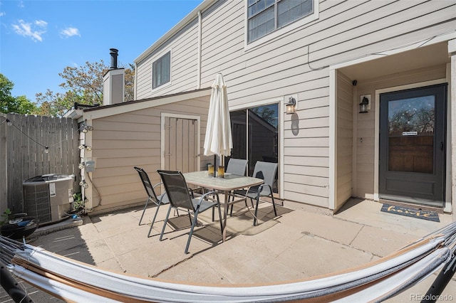 7705 W 87th Dr, Arvada, CO 80005 - view of patio / terrace with outdoor dining space