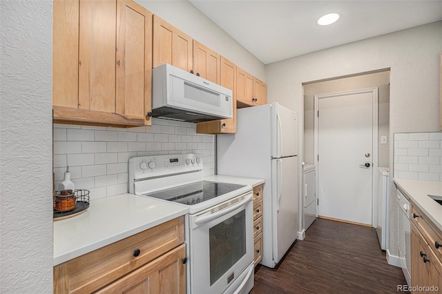 7705 W 87th Dr, Arvada, CO 80005 - kitchen with white appliances, tasteful backsplash, light brown cabinetry, dark wood-style flooring, and recessed lighting