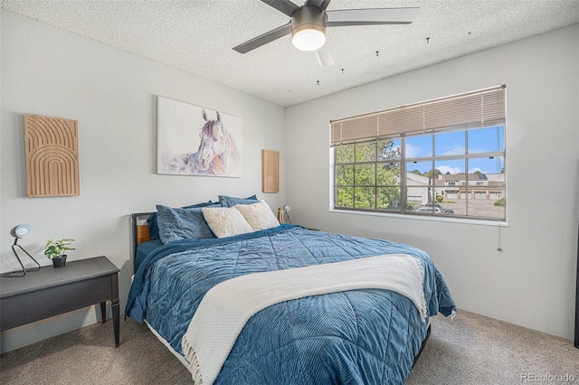 7705 W 87th Dr, Arvada, CO 80005 - carpeted bedroom featuring a textured ceiling and a ceiling fan