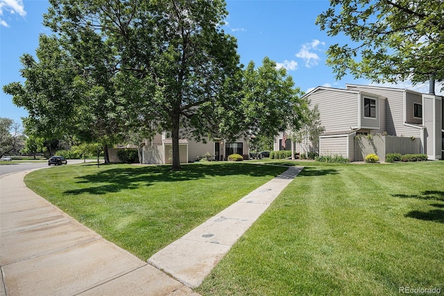 7705 W 87th Dr, Arvada, CO 80005 - view of home's community featuring a yard