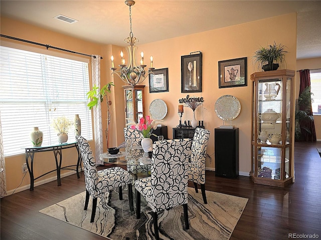 13626 Garfield St Unit A, Thornton, CO 80602 - dining area with a chandelier and wood finished floors