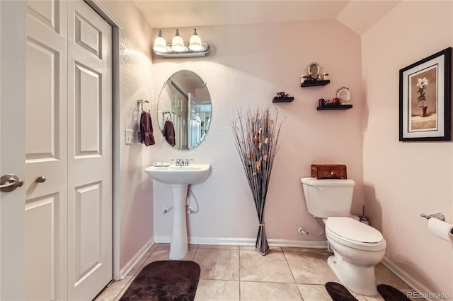 13626 Garfield St Unit A, Thornton, CO 80602 - bathroom with tile patterned floors and lofted ceiling