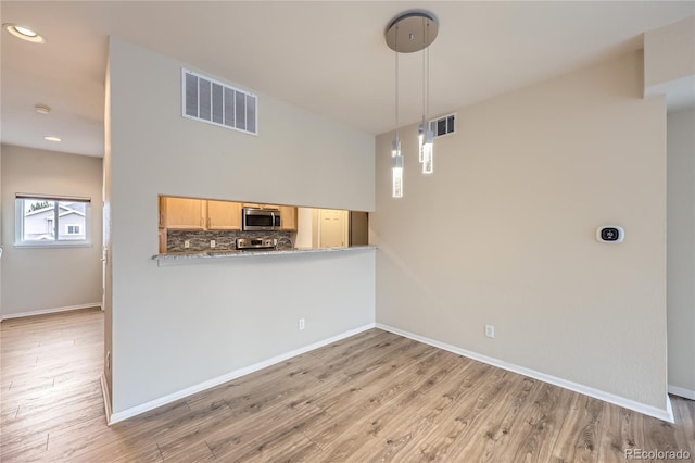 interior space with light hardwood / wood-style floors