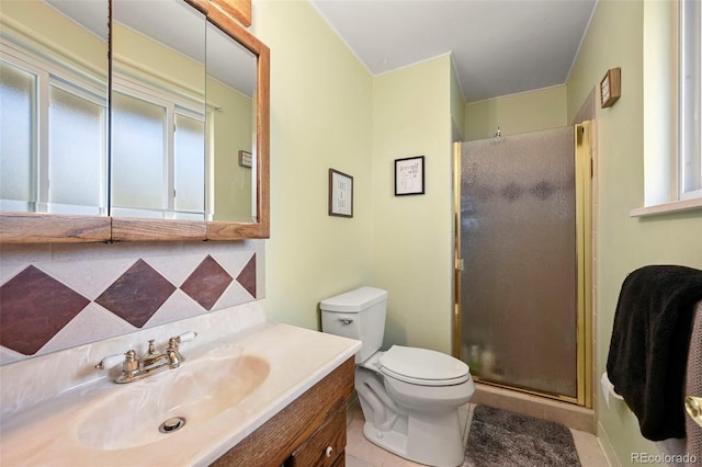 full bathroom with a shower stall, toilet, plenty of natural light, and tile patterned floors