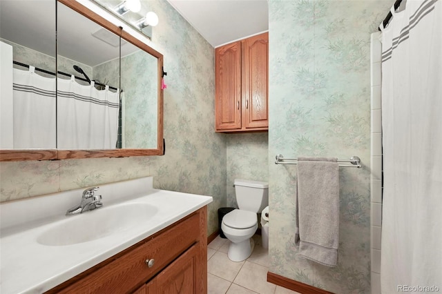 full bath featuring vanity, toilet, tile patterned flooring, and wallpapered walls