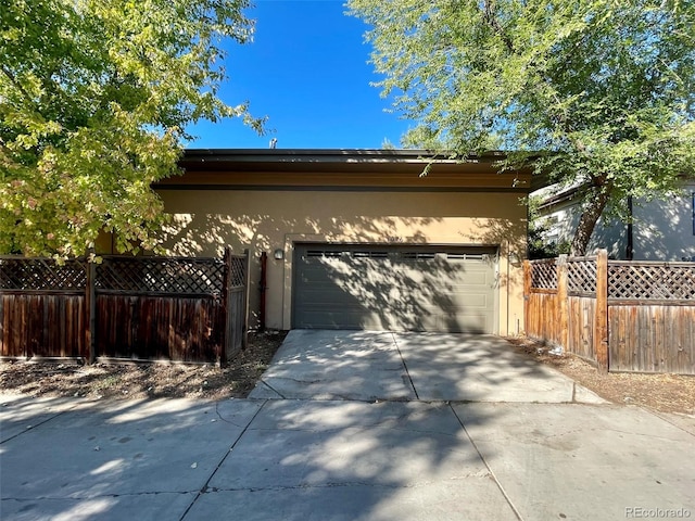 view of side of property with a garage