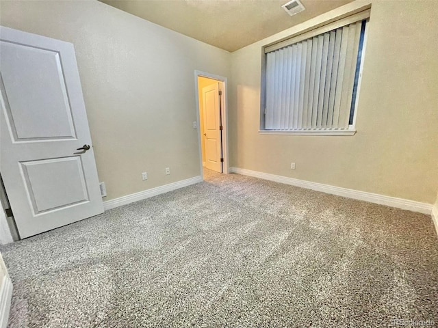 unfurnished bedroom with carpet flooring