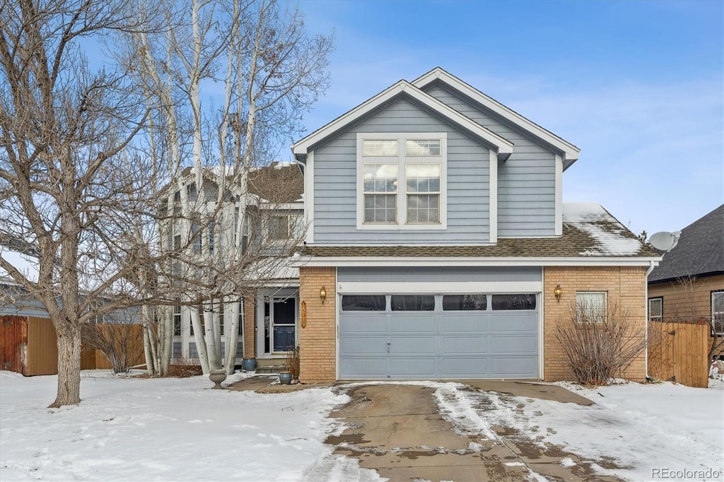 front of property with a garage