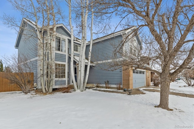 view of front of property featuring a garage