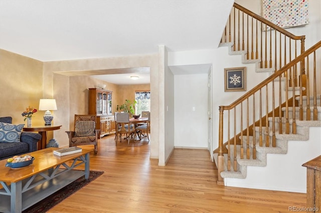 foyer entrance featuring hardwood / wood-style floors