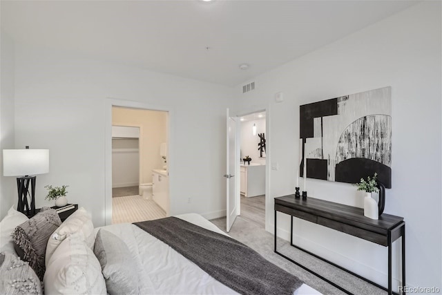 3500 S Corona St Unit 407, Englewood, CO 80113 - bedroom with carpet floors, baseboards, and ensuite bath