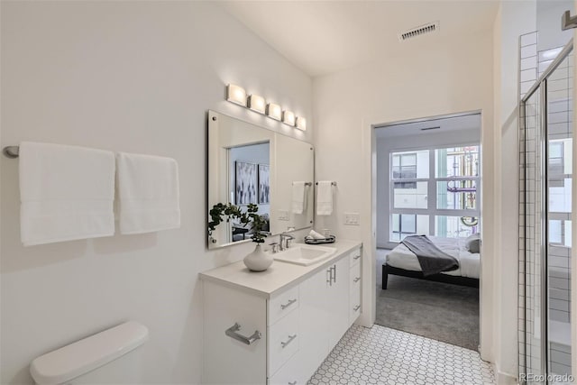 3500 S Corona St Unit 407, Englewood, CO 80113 - ensuite bathroom with vanity, toilet, and a shower
