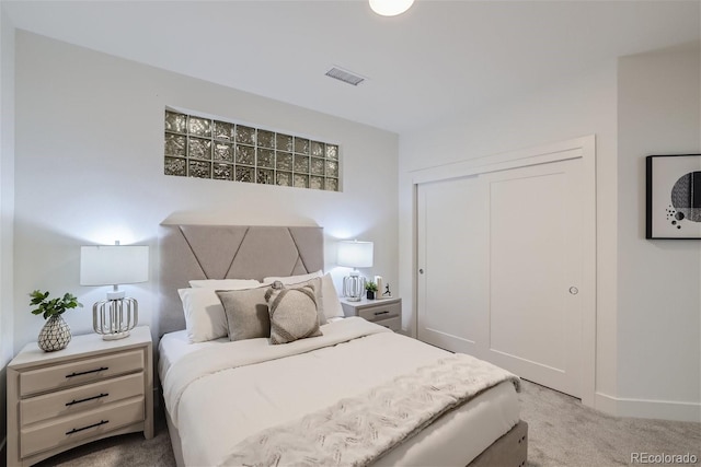 3500 S Corona St Unit 407, Englewood, CO 80113 - carpeted bedroom featuring a closet and baseboards