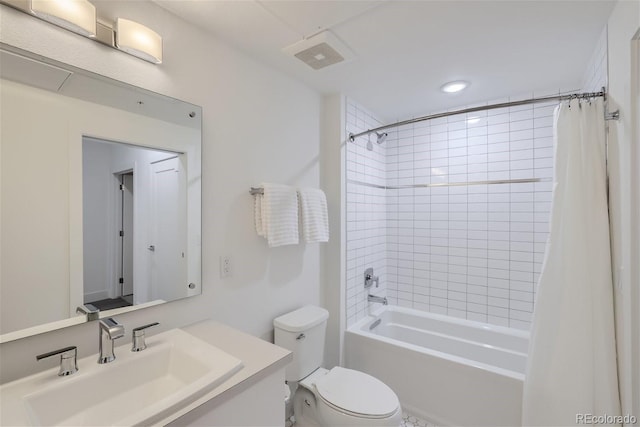 3500 S Corona St Unit 407, Englewood, CO 80113 - bathroom featuring toilet, vanity, shower / tub combo, and recessed lighting