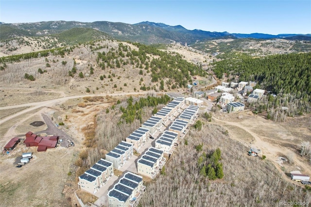 bird's eye view with a mountain view