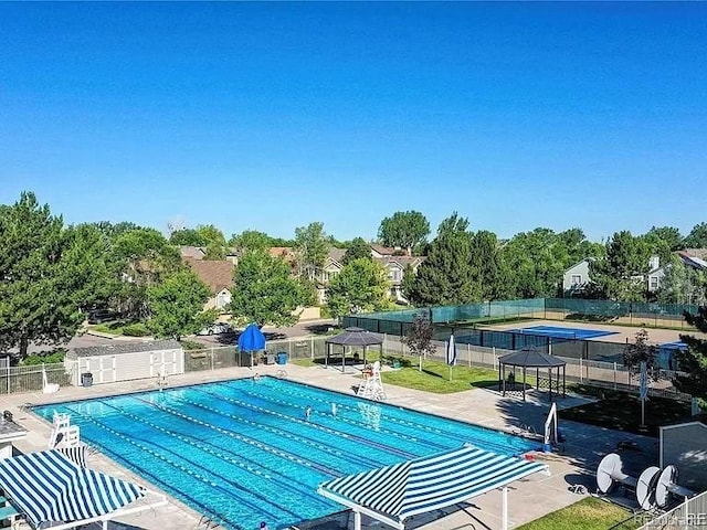 view of pool featuring a gazebo and a patio area