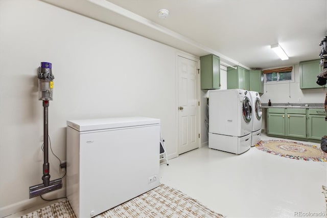 600 Vine St, Denver, CO 80206 - laundry area featuring cabinet space and separate washer and dryer
