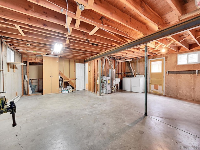 basement with independent washer and dryer and gas water heater