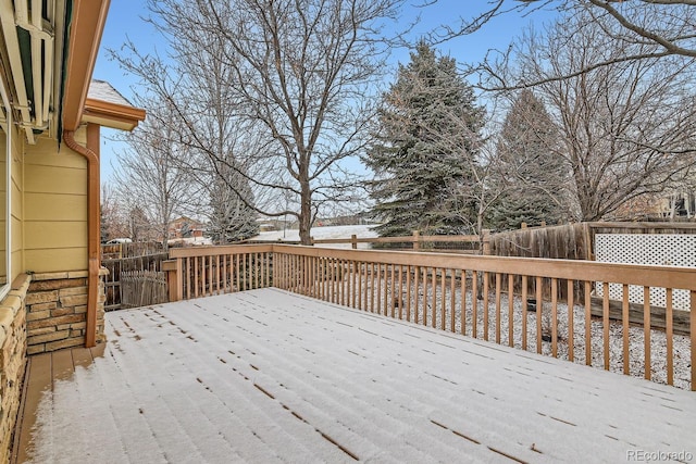 view of snow covered deck