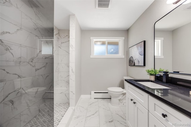 bathroom featuring tiled shower, a baseboard radiator, vanity, and toilet