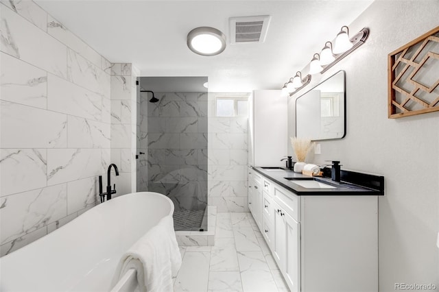 bathroom featuring vanity, tile walls, and plus walk in shower