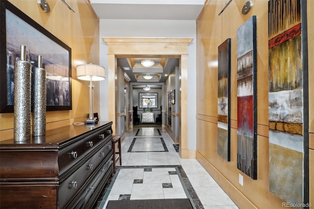 hall with light tile patterned floors