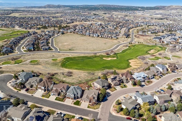 bird's eye view featuring a mountain view, a residential view, and view of golf course