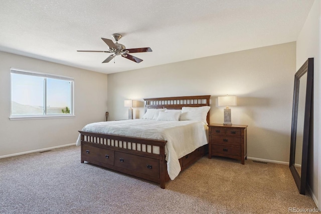 bedroom featuring visible vents, baseboards, and carpet floors