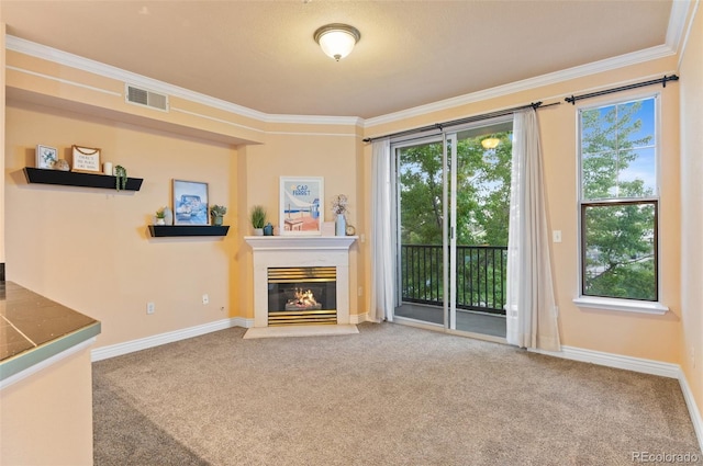 2154 Concord Ln, Superior, CO 80027 - living room featuring carpet floors, crown molding, baseboards, and a fireplace with flush hearth
