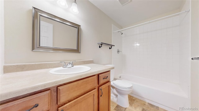 full bathroom with toilet, visible vents, shower / washtub combination, and vanity