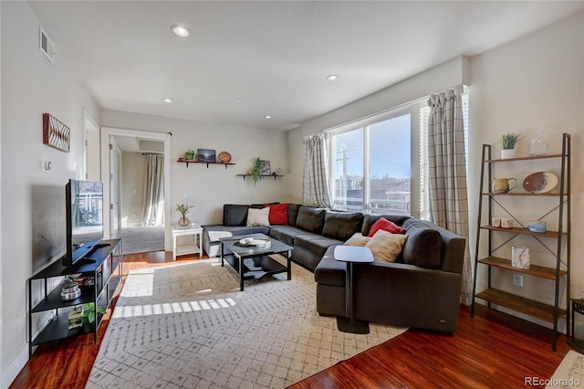 living room with dark wood-type flooring