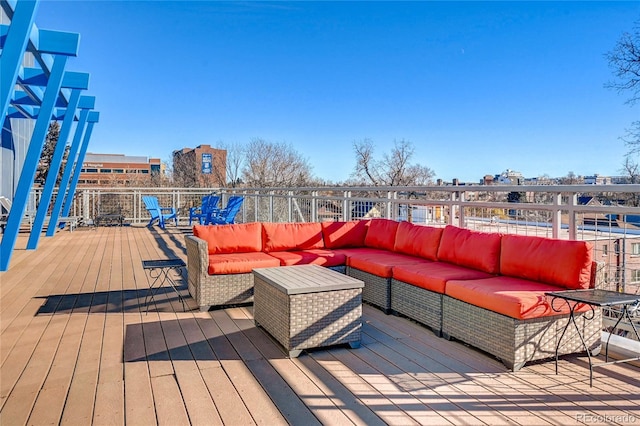 wooden deck featuring an outdoor living space