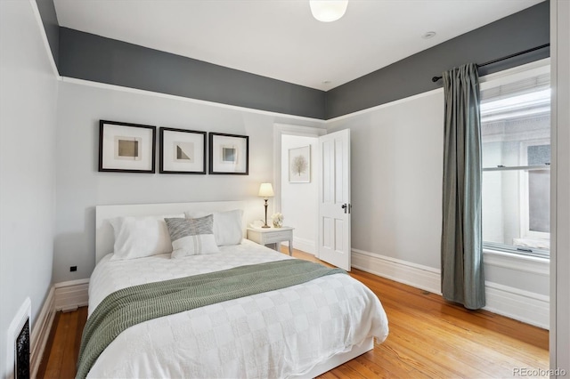 bedroom featuring hardwood / wood-style floors