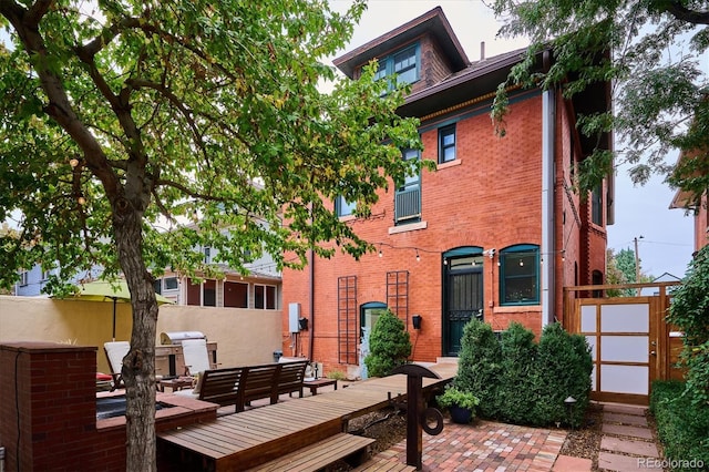 rear view of house featuring a patio area