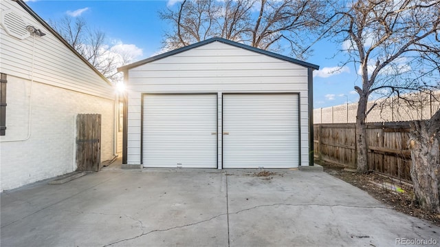 detached garage with fence