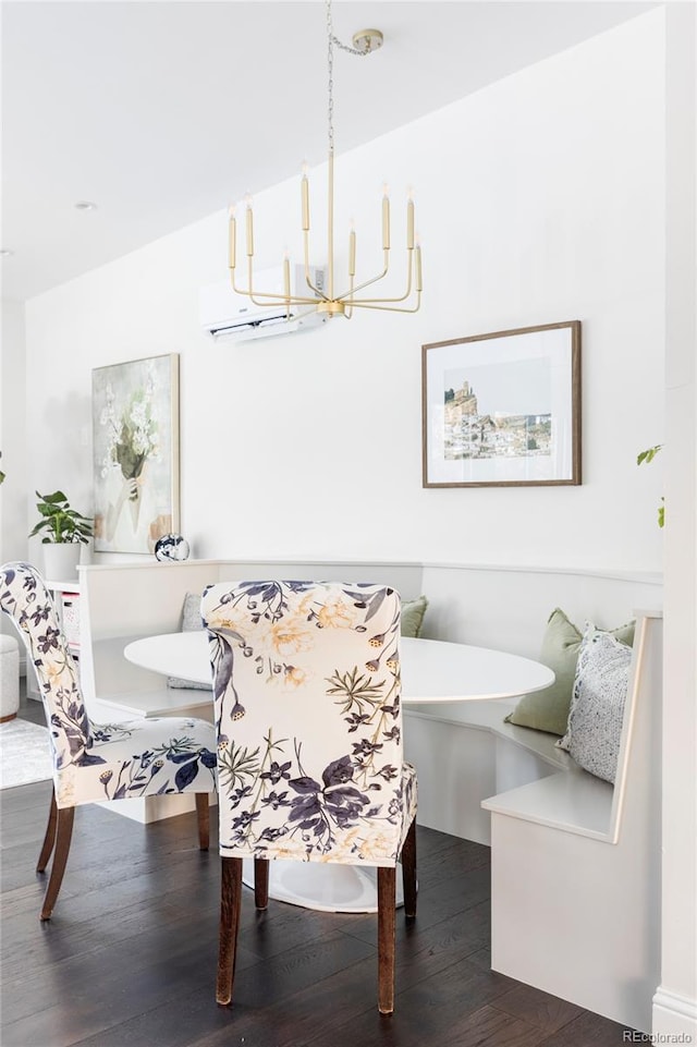 dining area with breakfast area and hardwood / wood-style flooring