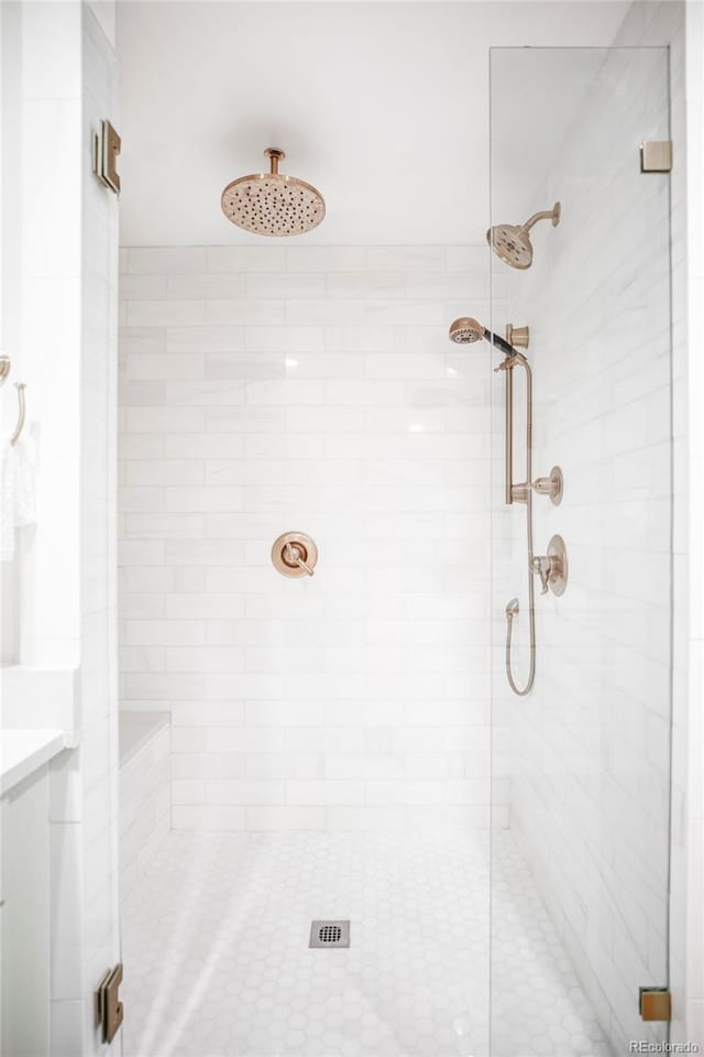 bathroom featuring an enclosed shower