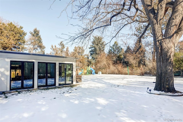 view of yard covered in snow