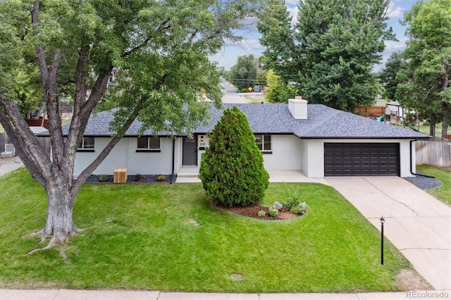 ranch-style home with stucco siding, a front yard, roof with shingles, and an attached garage