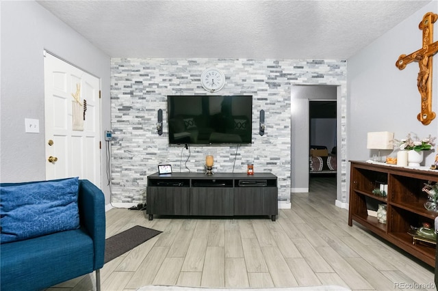 living room with a textured ceiling