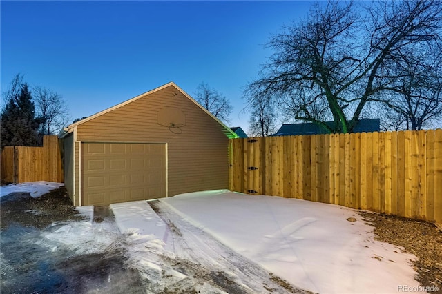 view of snow covered garage