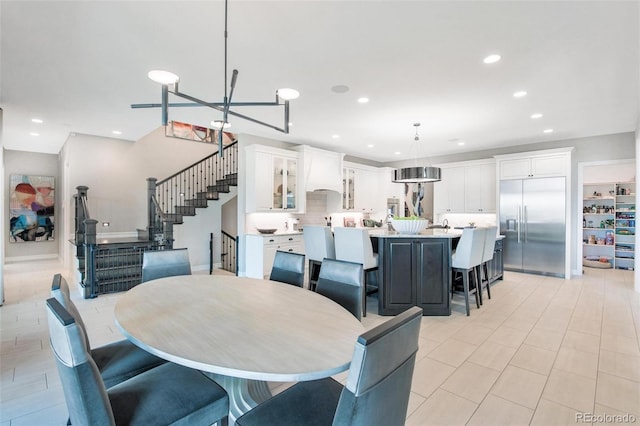 dining area with a notable chandelier