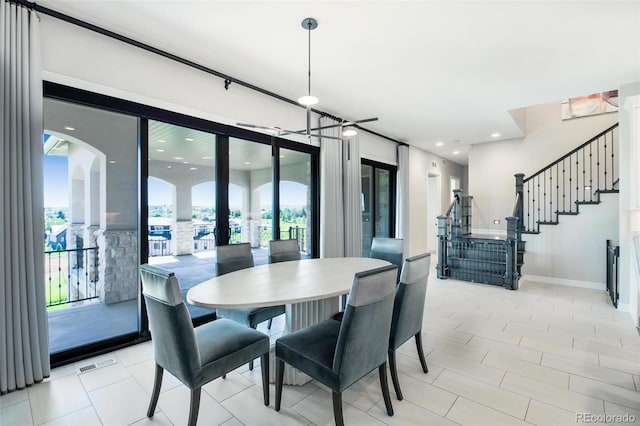 dining space with light tile patterned floors