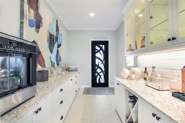 mudroom featuring light tile patterned flooring