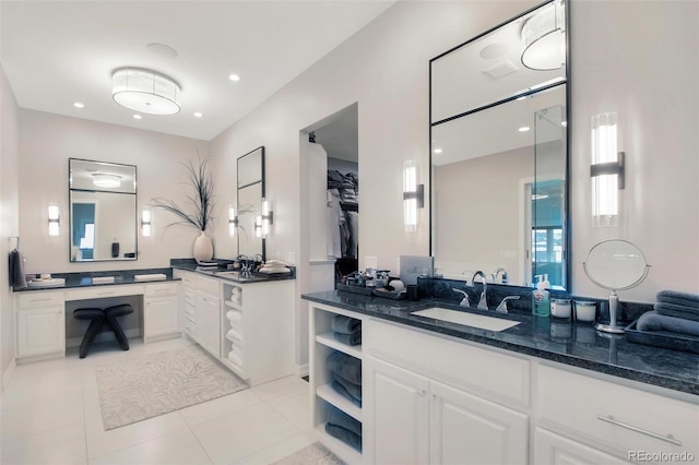 bathroom featuring tile patterned floors and vanity