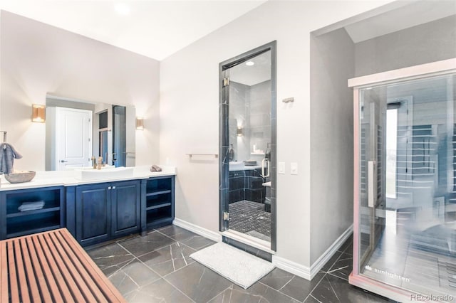 bathroom featuring an enclosed shower and vanity