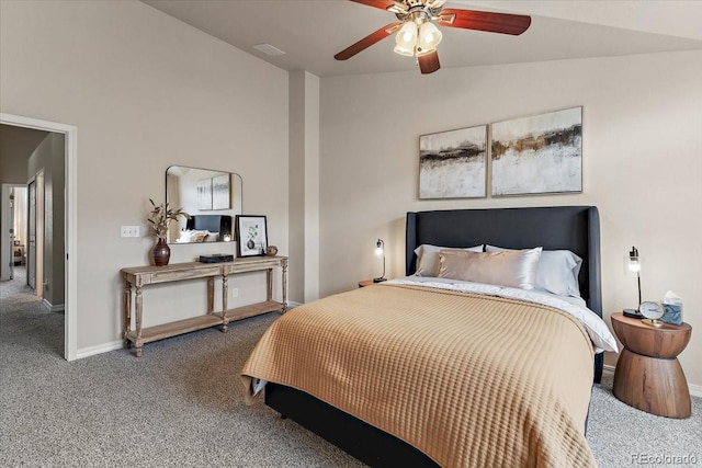 carpeted bedroom with baseboards, ceiling fan, and vaulted ceiling